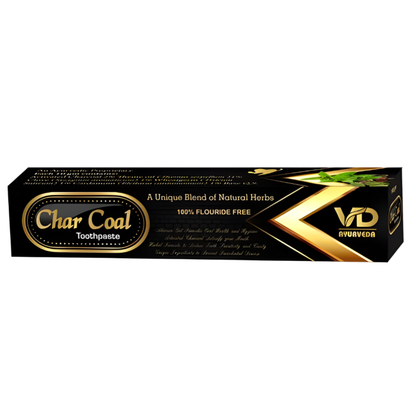 A dark-colored rectangular box containing Dhanvantari Vaid Ayurveda Toothpaste with activated charcoal efficiently eliminates most unwanted objects adhering to the surface of the teeth.